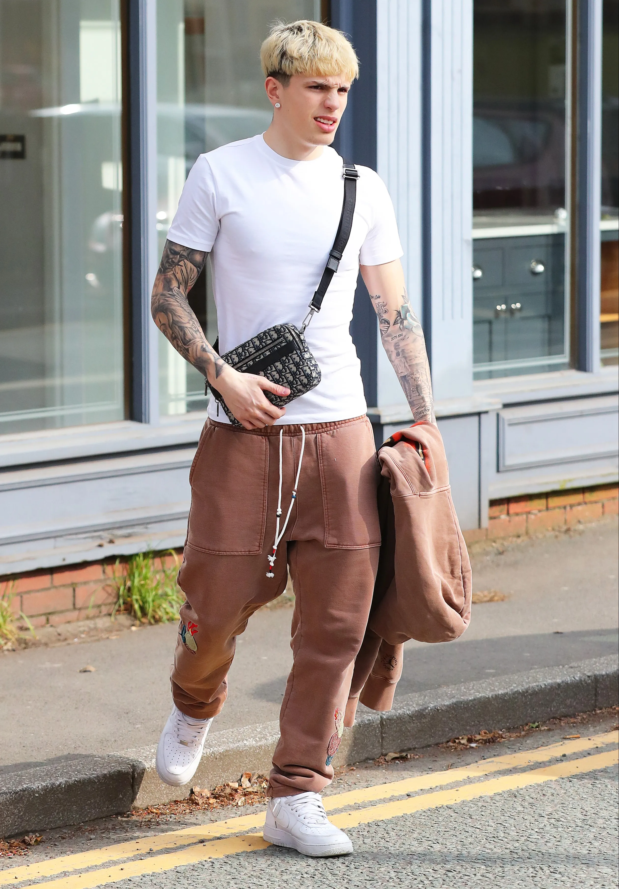 Dashing In Brown: Man Utd Star Alejandro Garnacho Steps Out In Style After Dining At Cibo Restaurant.Tđ