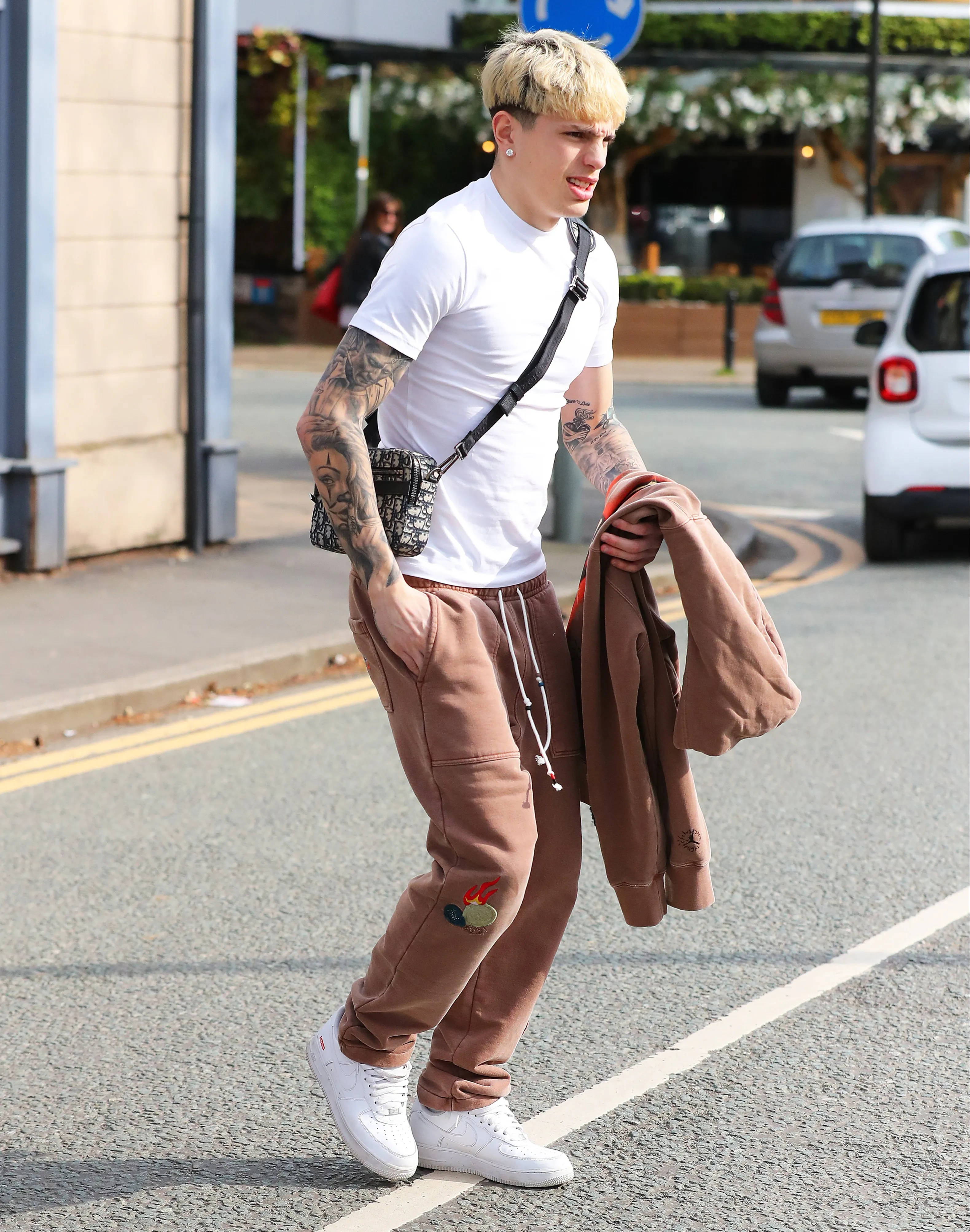 Dashing In Brown: Man Utd Star Alejandro Garnacho Steps Out In Style After Dining At Cibo Restaurant.Tđ