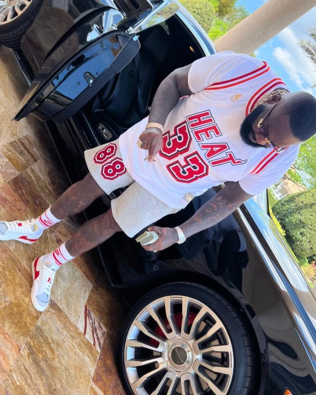 Rick Ross Flaunts His Brand New Limited Edition Car, Purchased For Nearly $14M, Just For Attending Chicago Bulls Games.Mariko