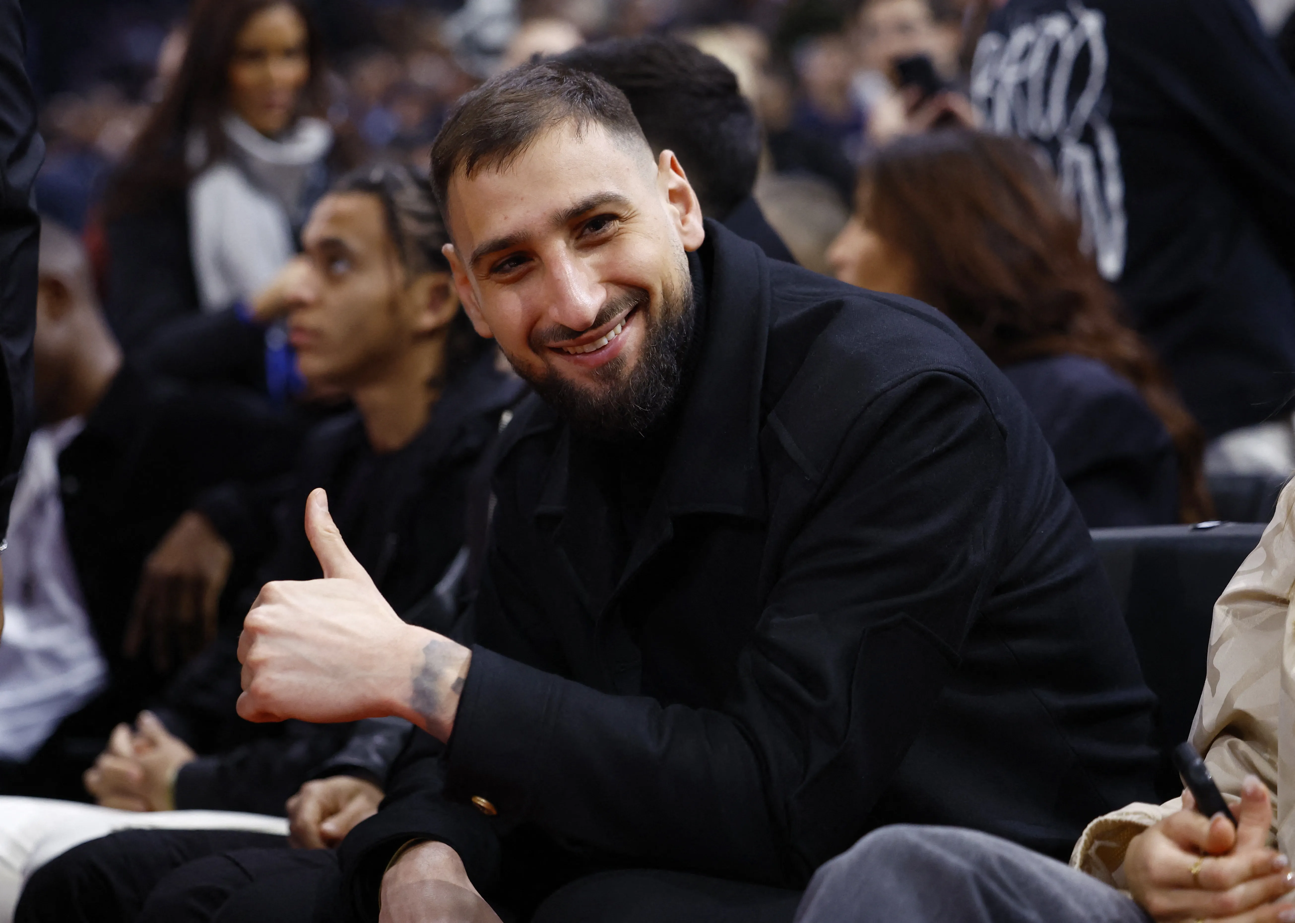 Gianluigo Donnarumma was also sat court side