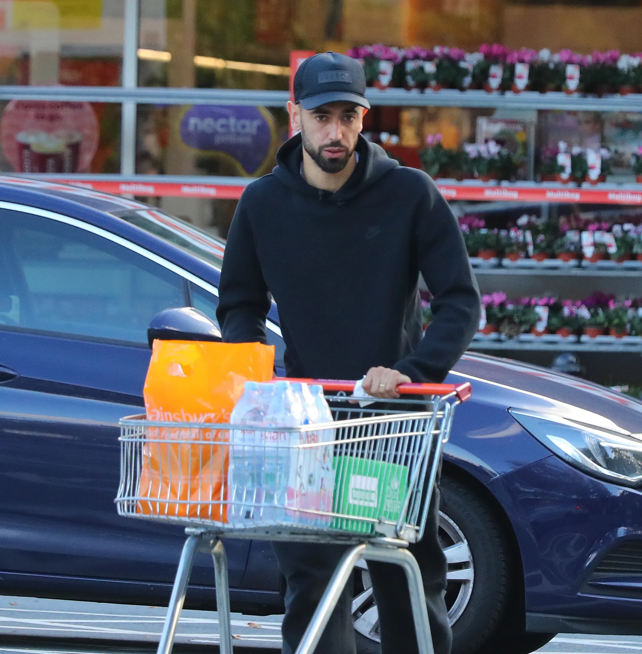 Bruno Fernandes paid a visit to the shops after arriving back in the UK