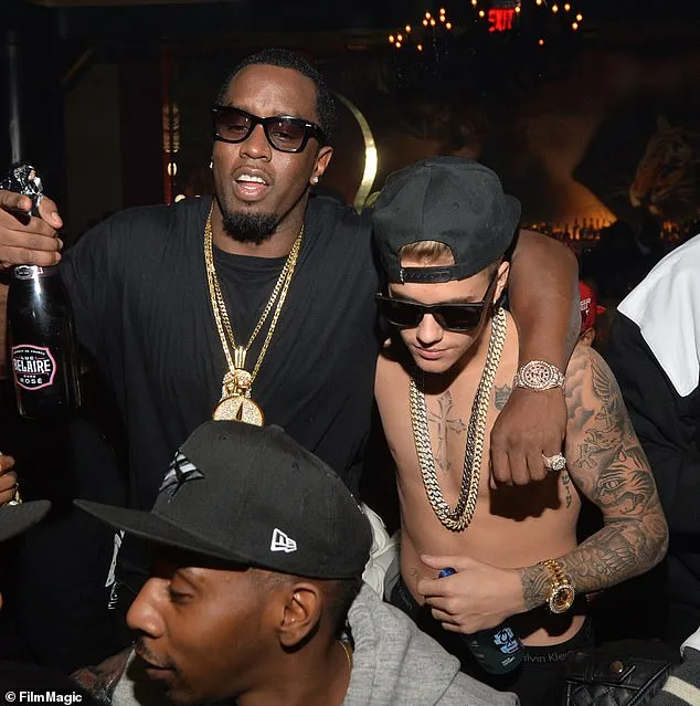 Sean 'Diddy' Combs and Justin Bieber attend Ciroc party at Vanquish Lounge on February 5, 2014