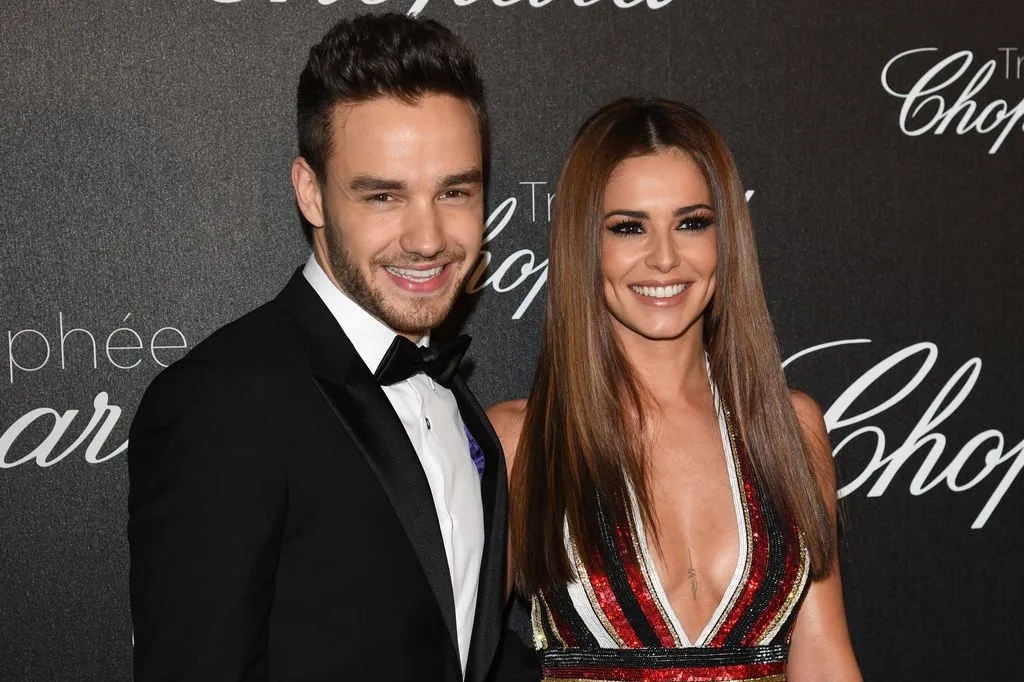 Liam Payne con un esmoquin negro y Cheryl Cole con un vestido de lentejuelas