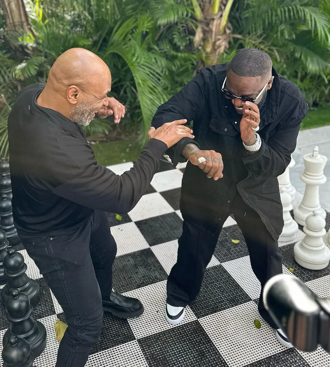 Rick Ross Surprises Mike Tyson With A Rolls-Royce Cullinan Cake To Celebrate His Son’S Ufc Victory (Video)